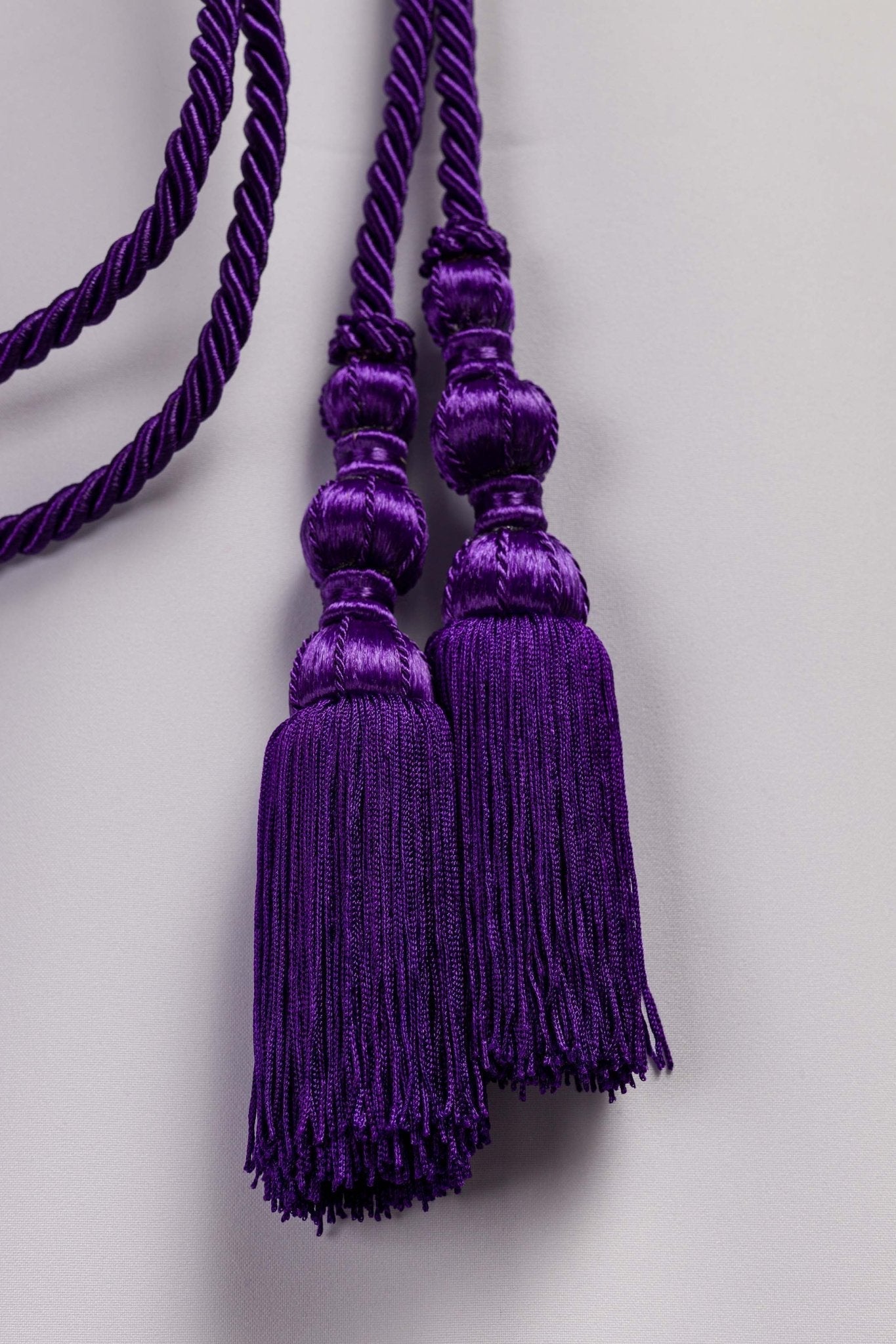 Cíngulo litúrgico morado